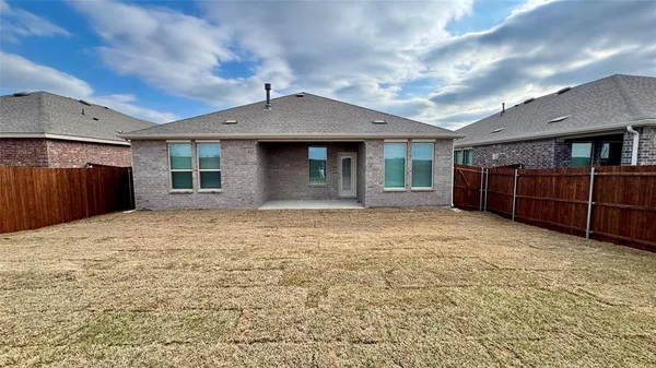 a house view with a backyard