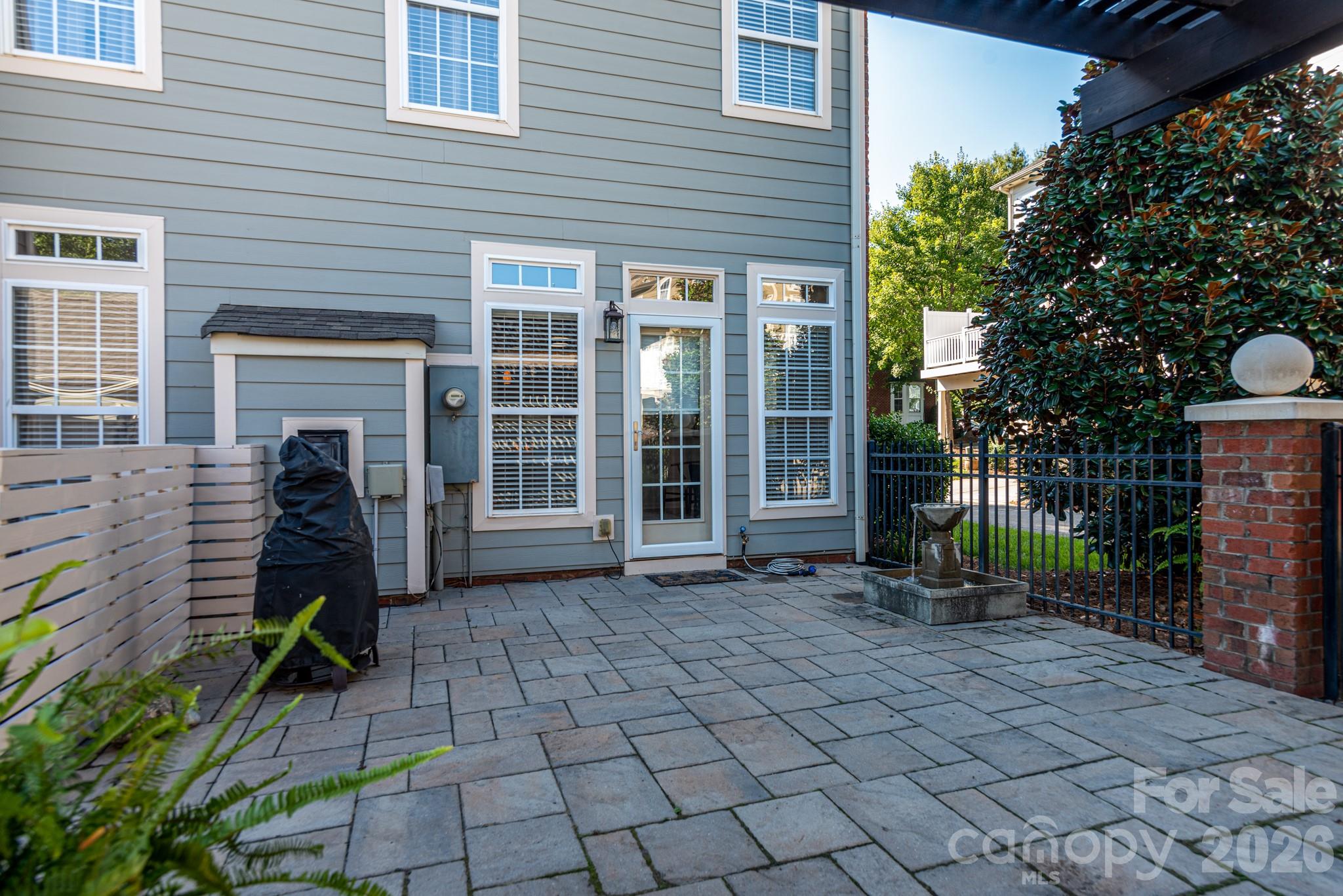 438 Magnolia Street Davidson, NC 28036 - Photo 4 of 20 a view of a house with backyard