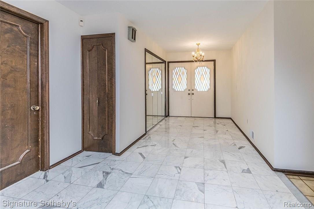 11403 Common Road Warren, MI 48093 - Photo 7 of 35 Marble tiled foyer