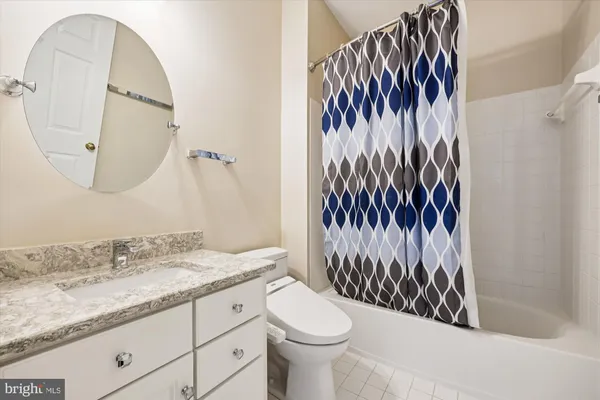 a view of a livingroom with wooden floor