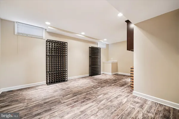 a view of a field of grass and trees