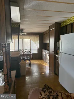 a lobby with furniture and rug