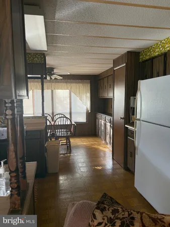 a lobby with furniture and rug