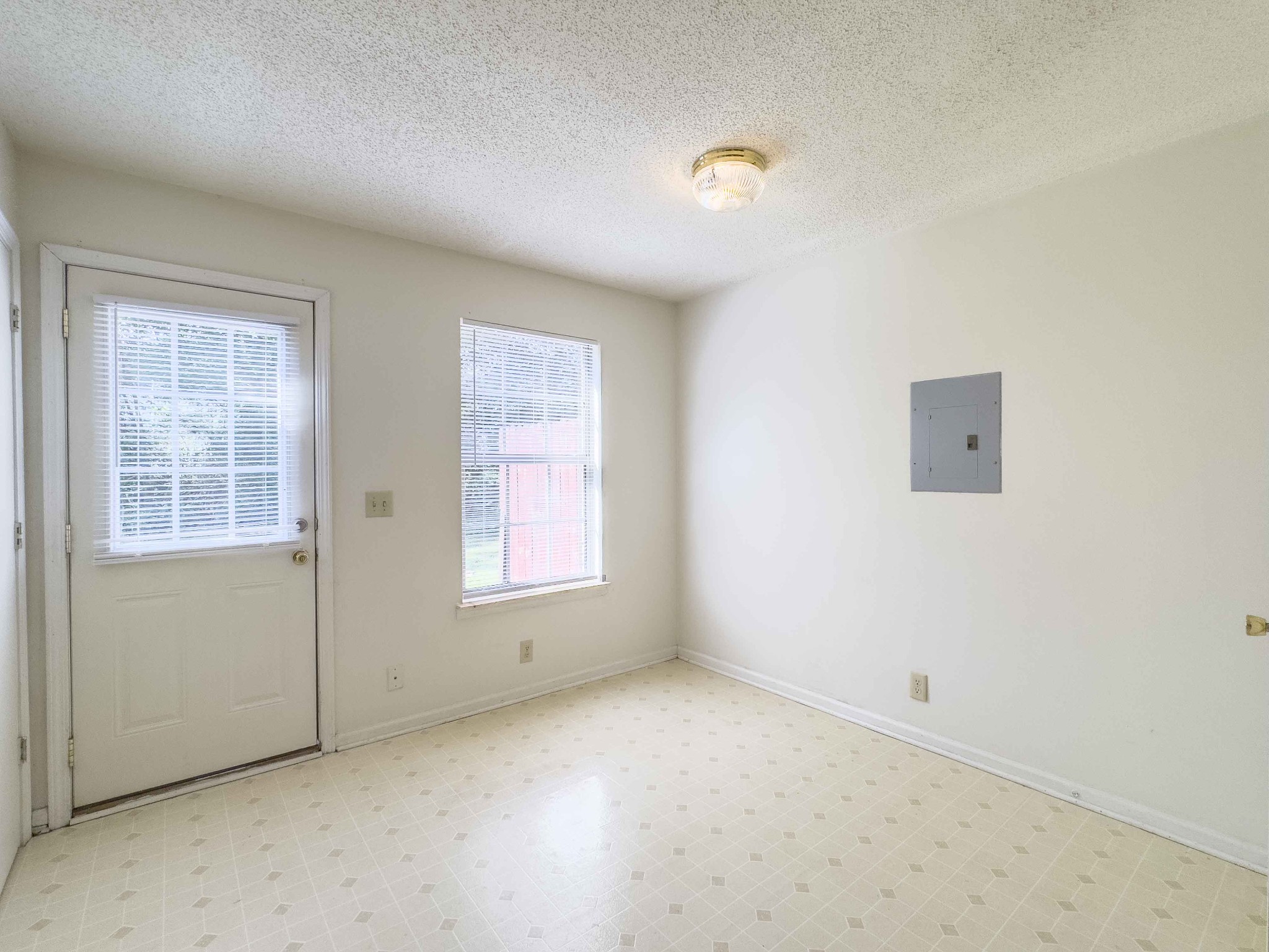 108 Hickory Trace Road, Unit 2 Clarksville, TN 37040 - Photo 9 of 22 an empty room with windows