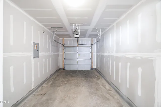 a view of a house with a backyard and porch