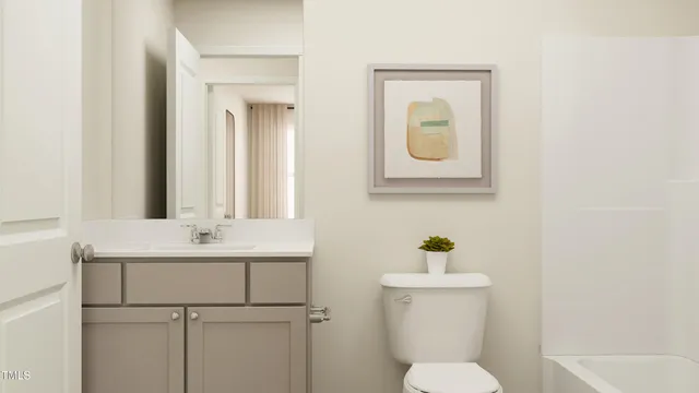 a bed room with a bed and chair