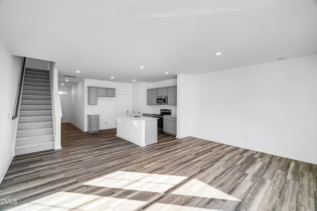 a view of kitchen with wooden floor