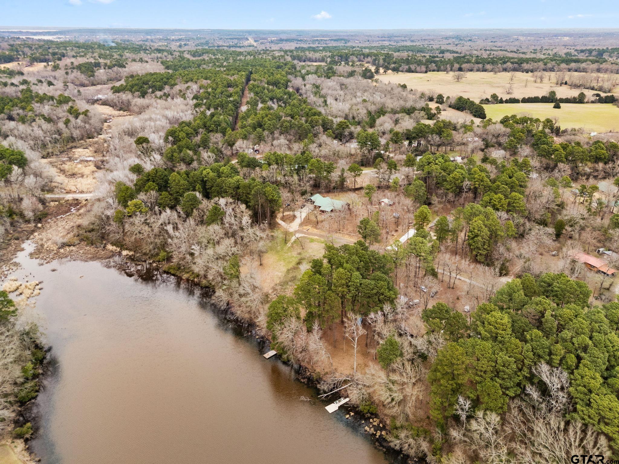 343 Laura Lane Bullard, TX 75757 - Photo 11 of 13 an aerial view of a houses with a lake
