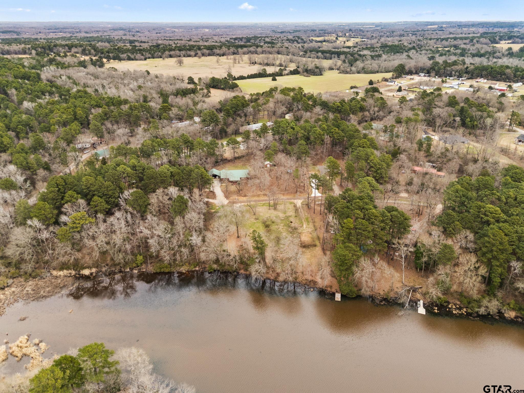 343 Laura Lane Bullard, TX 75757 - Photo 10 of 13 an aerial view of residential houses with outdoor space and river