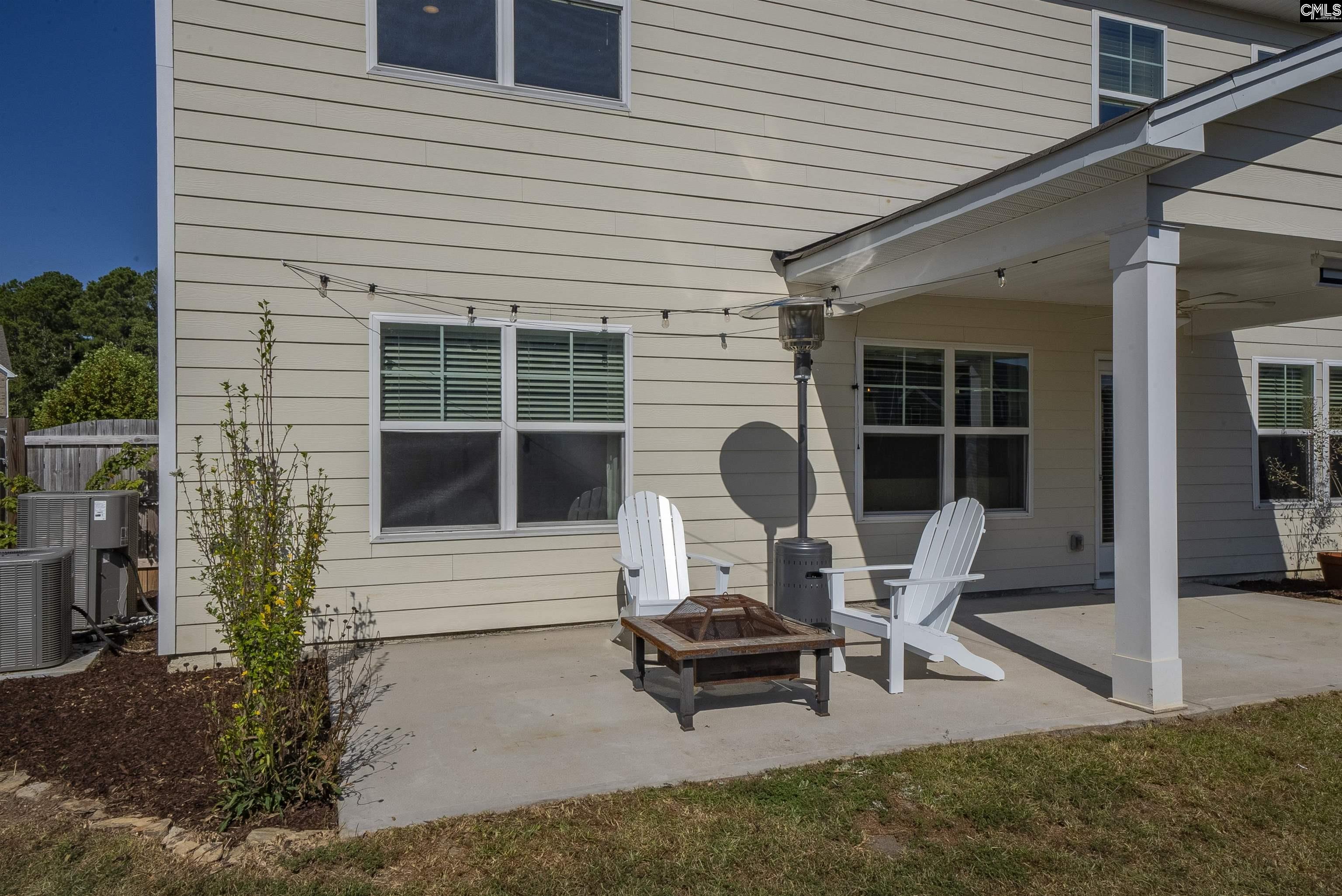 515 Malachite Lane Chapin, SC 29036 - Photo 55 of 63 a view of a bench in a patio