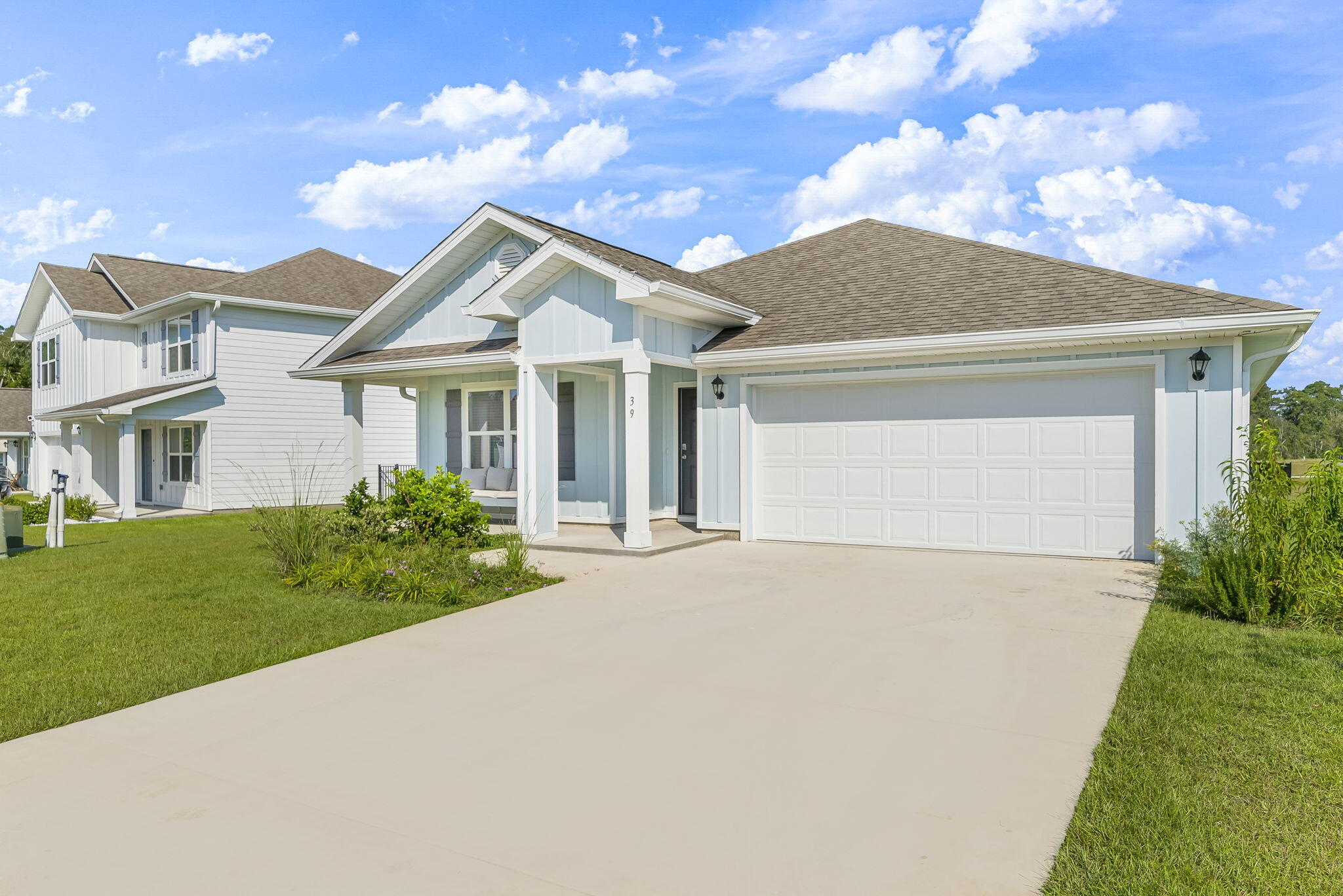 39 Riverwalk Crossing Freeport, FL 32439 - Photo 2 of 32 a front view of a house with garden