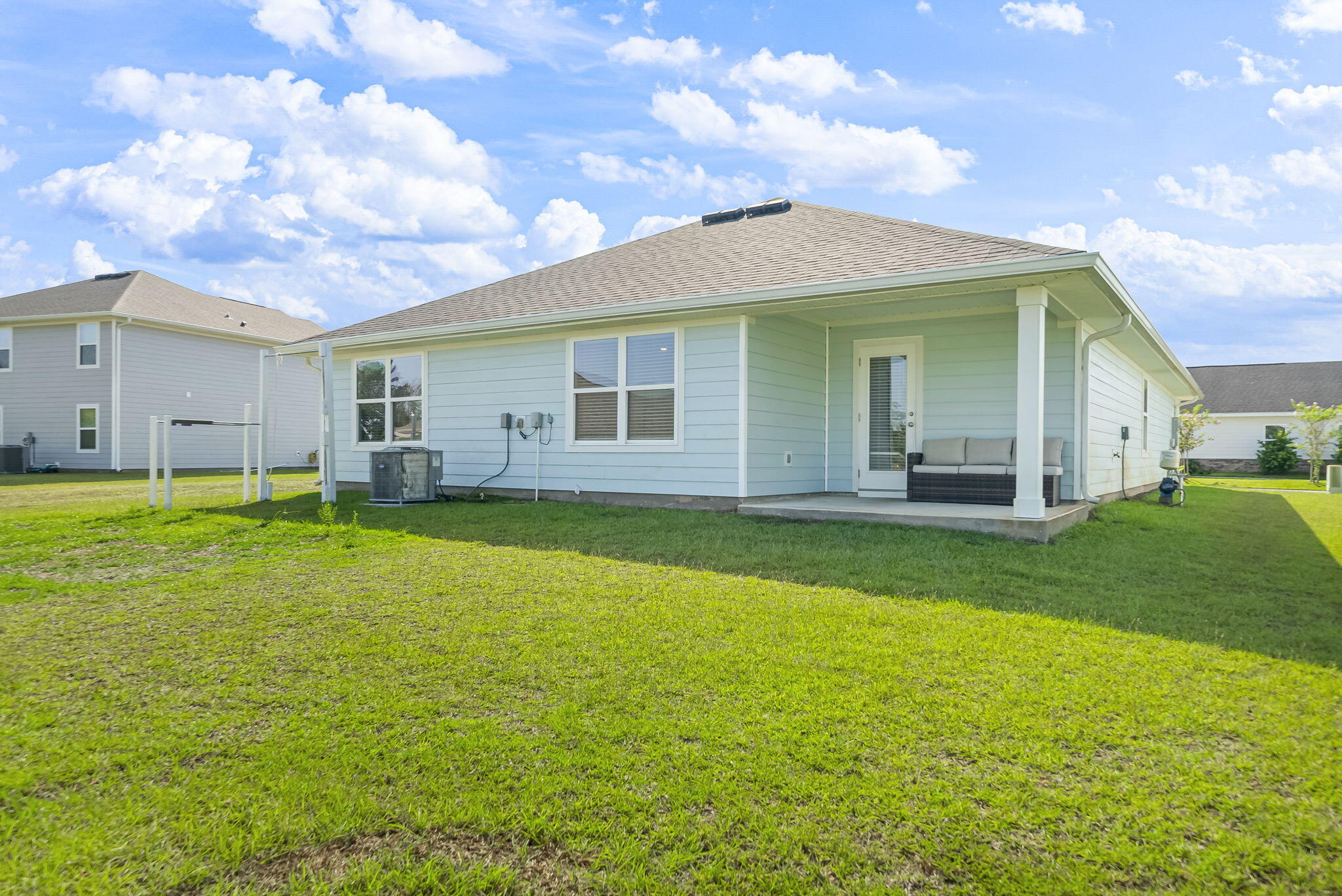 39 Riverwalk Crossing Freeport, FL 32439 - Photo 32 of 32 a view of a house with a backyard