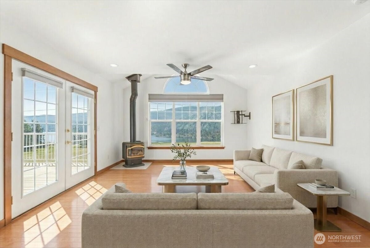 1190 Summit Boulevard Manson, WA 98831 - Photo 14 of 40 a living room with furniture and a large window