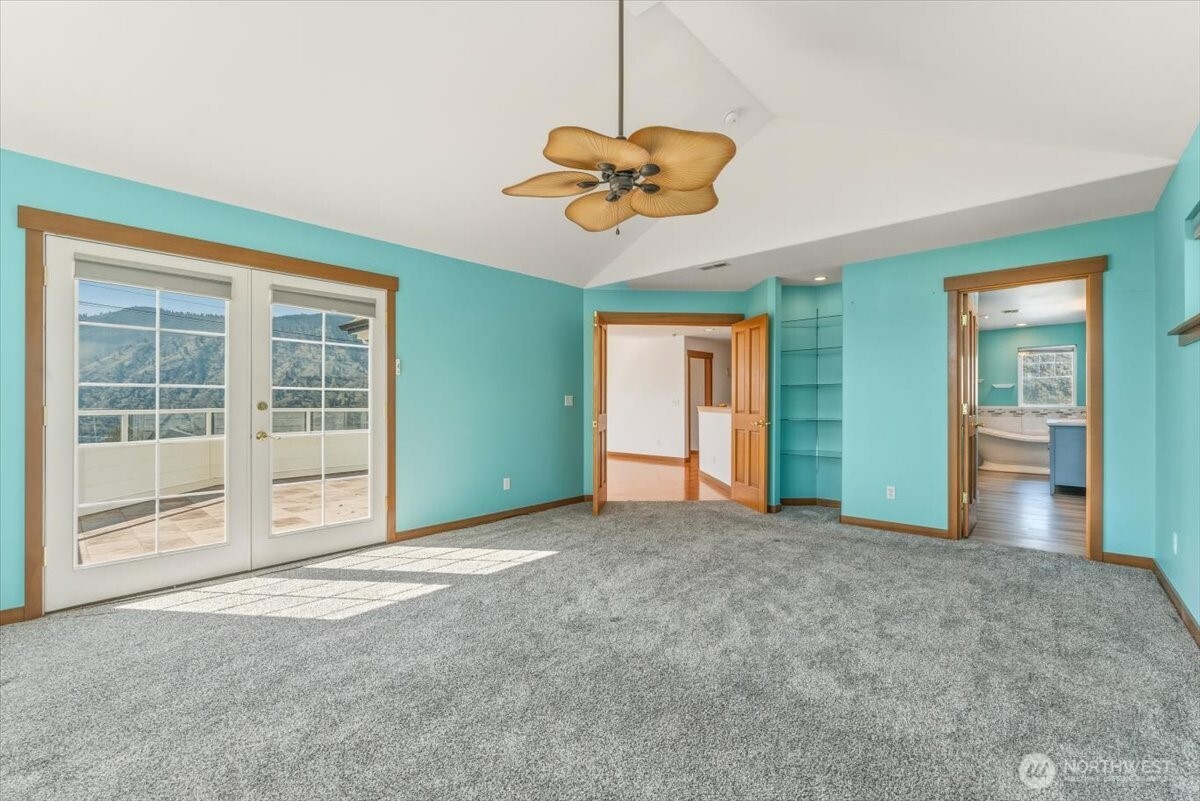 1190 Summit Boulevard Manson, WA 98831 - Photo 16 of 40 a view of an empty room with a window