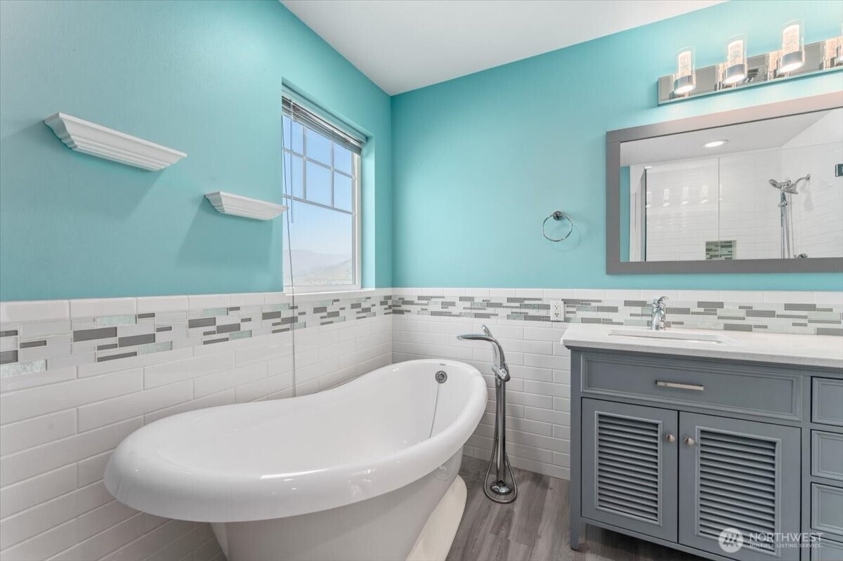 1190 Summit Boulevard Manson, WA 98831 - Photo 18 of 40 a bathroom with a sink and a mirror