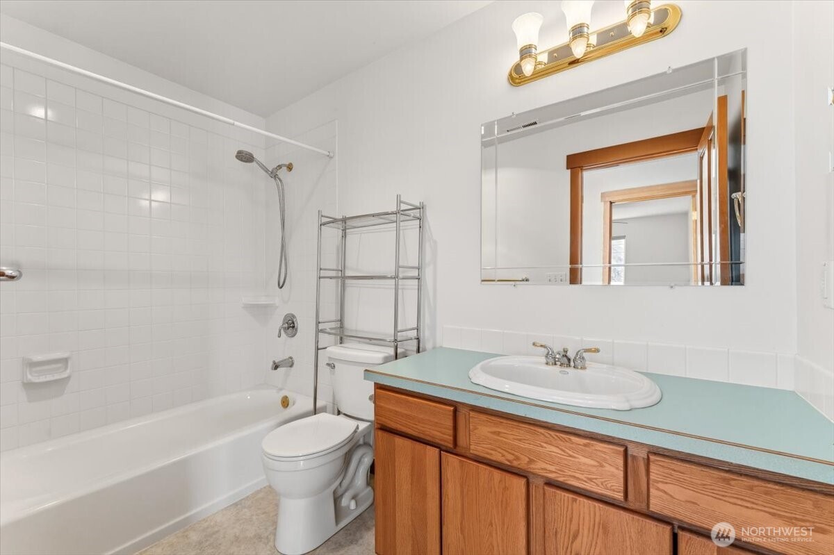 1190 Summit Boulevard Manson, WA 98831 - Photo 22 of 40 a bathroom with a sink a toilet and shower