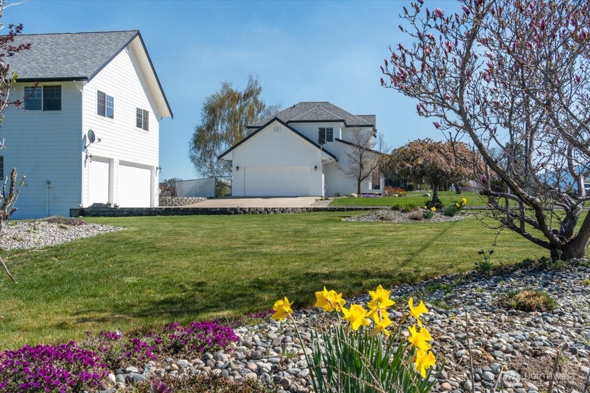 1190 Summit Boulevard Manson, WA 98831 - Photo 37 of 40 a front view of house with garden