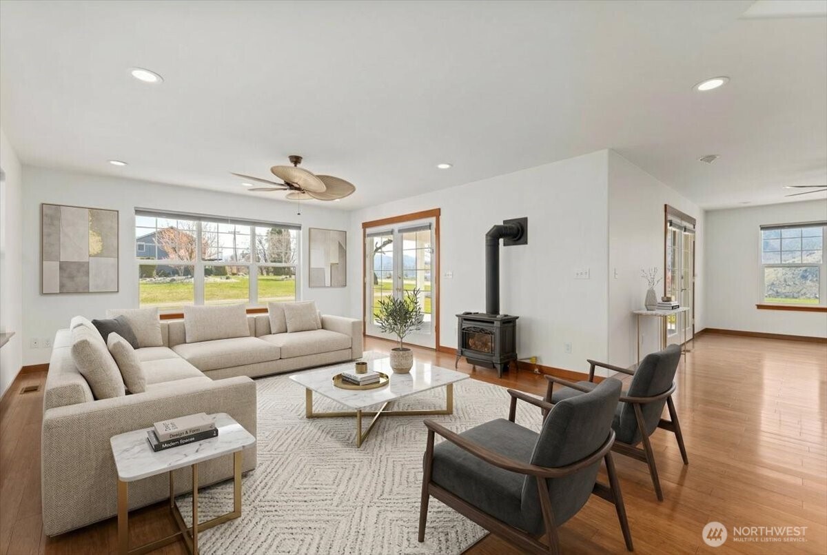 1190 Summit Boulevard Manson, WA 98831 - Photo 6 of 40 a living room with furniture and a large window