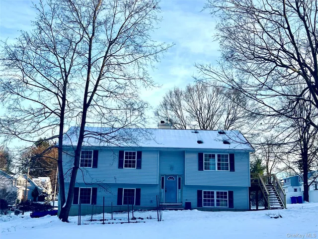 a view of a house with a snow