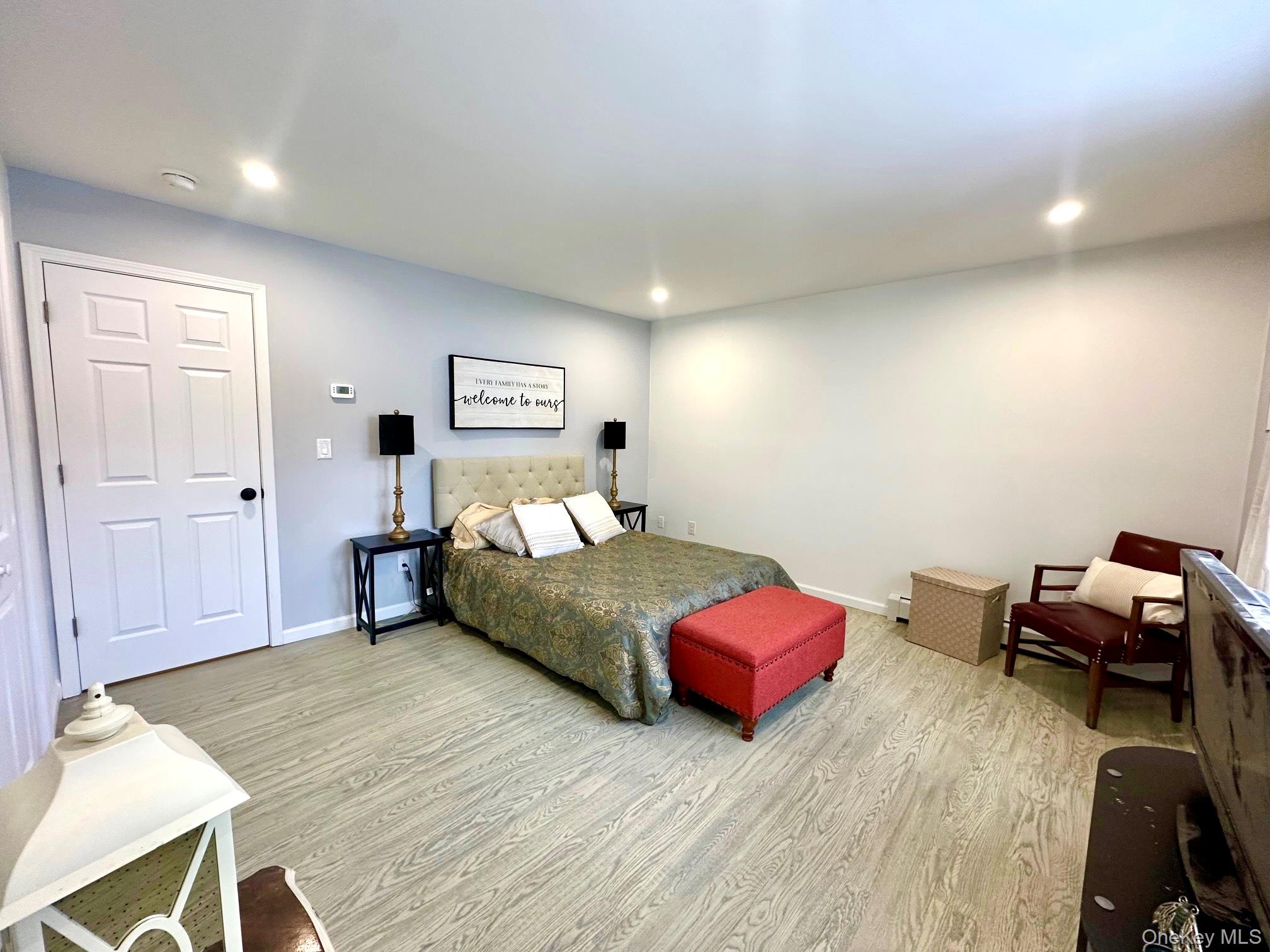 25 Clinton Street Middletown, NY 10940 - Photo 20 of 36 a bedroom with furniture and a wooden floor