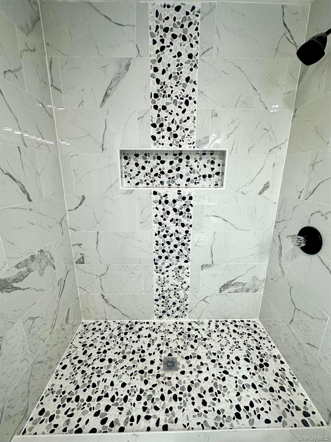 25 Clinton Street Middletown, NY 10940 - Photo 23 of 36 a bathroom with a shower