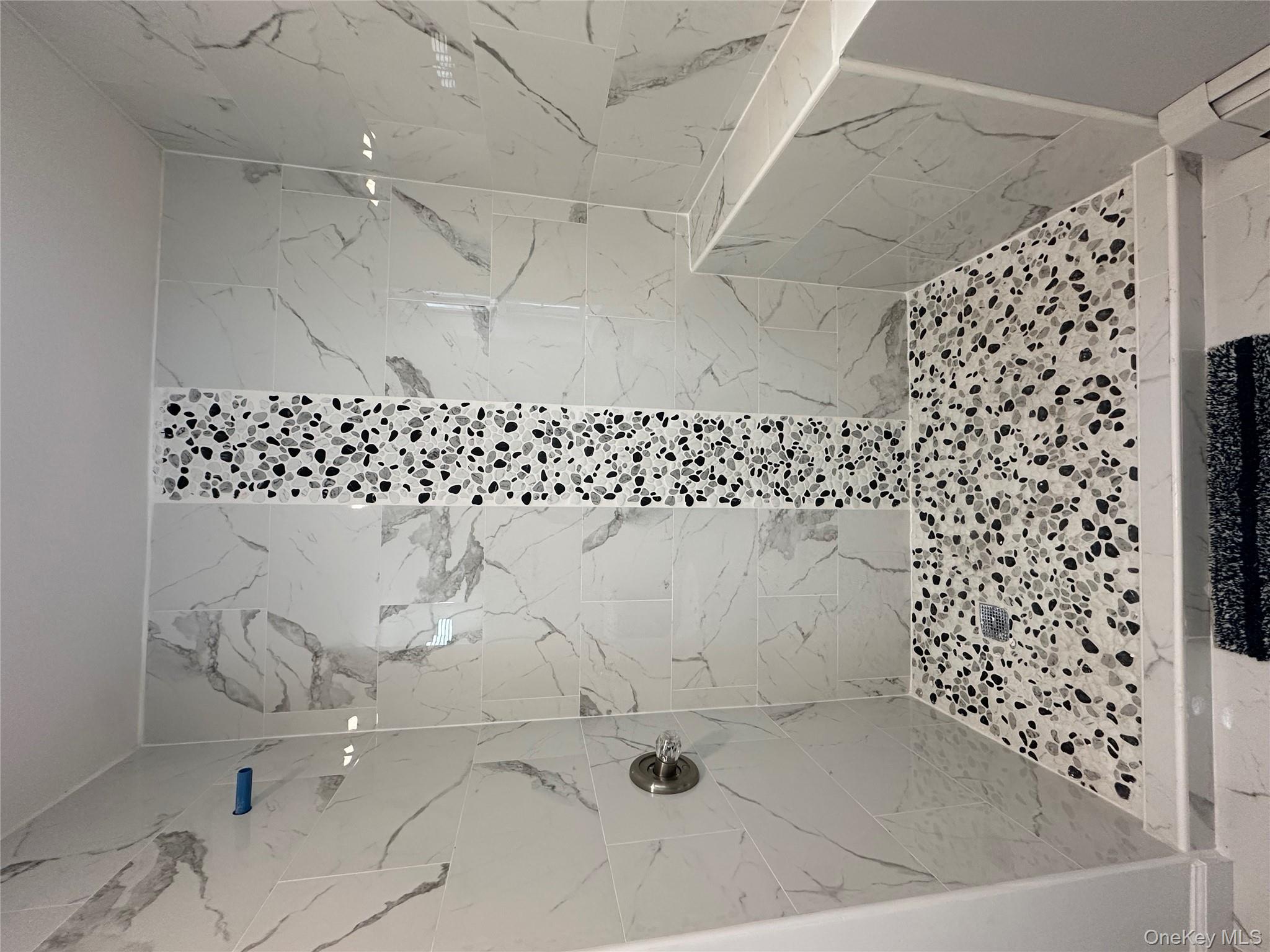 25 Clinton Street Middletown, NY 10940 - Photo 29 of 36 a bathroom with a shower