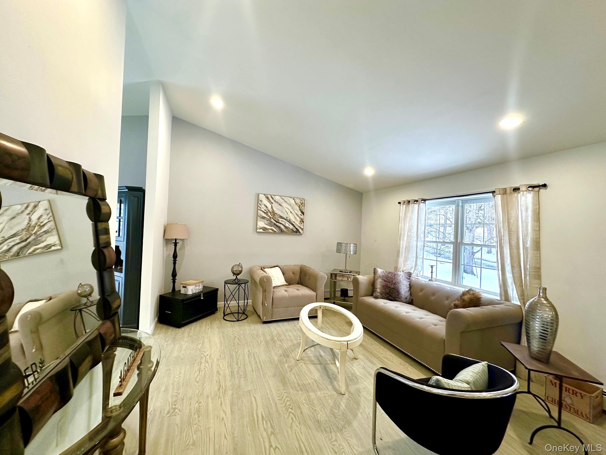 25 Clinton Street Middletown, NY 10940 - Photo 5 of 36 a living room with furniture and a window