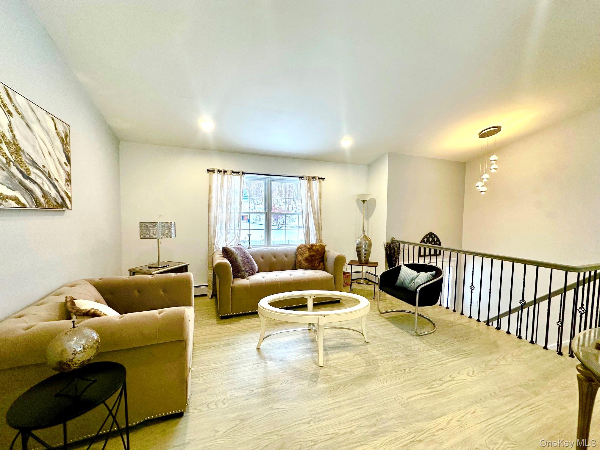 25 Clinton Street Middletown, NY 10940 - Photo 6 of 36 a living room with furniture and a window