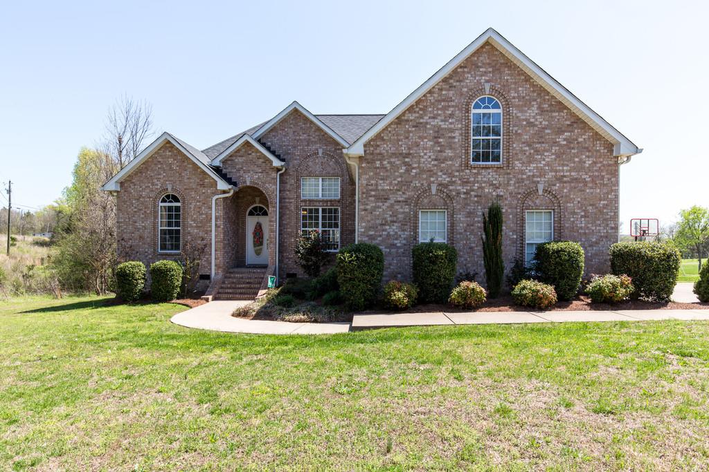 501 Sugar Flat Road Lebanon, TN 37087 - Photo 1 of 16 a front view of a house with yard and green space