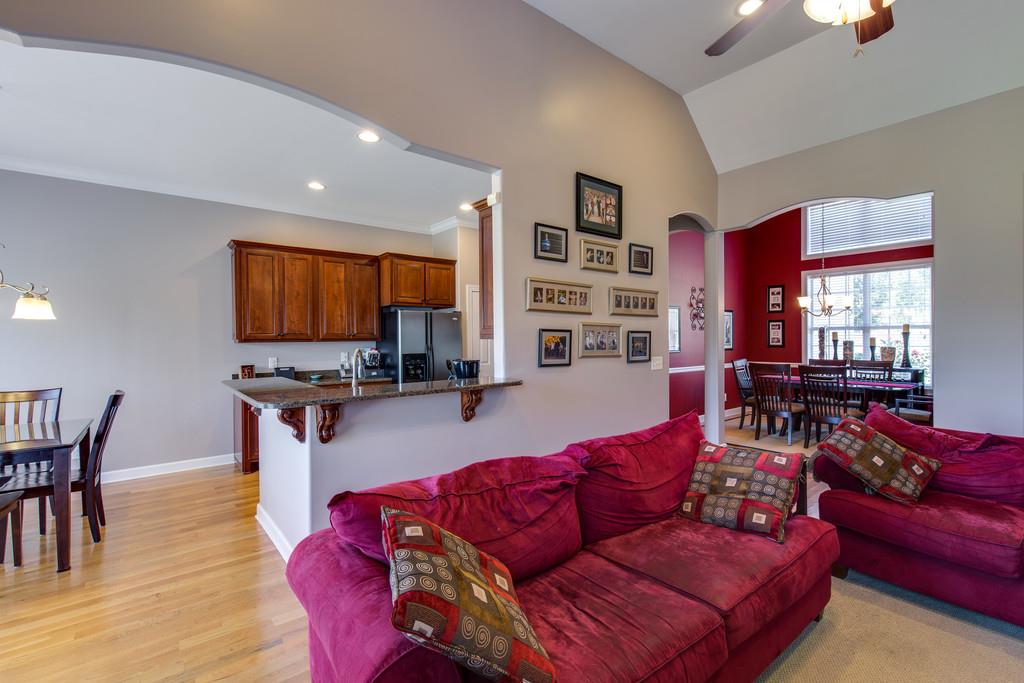 501 Sugar Flat Road Lebanon, TN 37087 - Photo 8 of 16 a living room with furniture flat screen tv and wooden floor