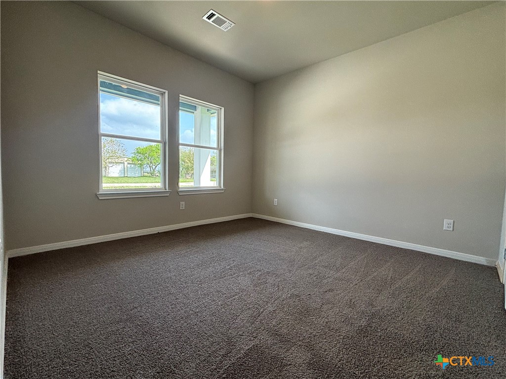 837 Swallow Drive Palacios, TX 77465 - Photo 15 of 35 an empty room with a window