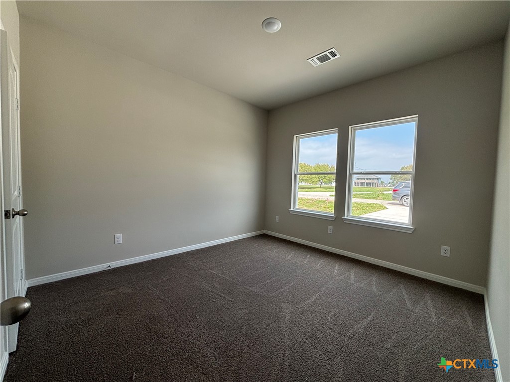 837 Swallow Drive Palacios, TX 77465 - Photo 19 of 35 an empty room with a window