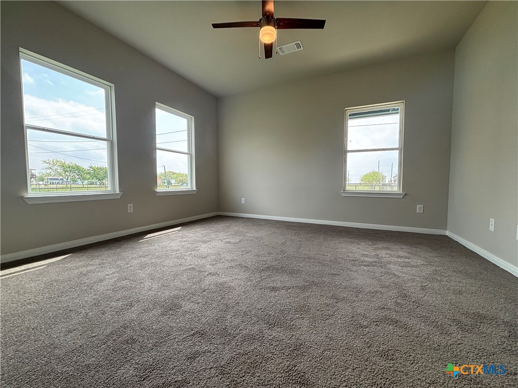 837 Swallow Drive Palacios, TX 77465 - Photo 20 of 35 an empty room with windows