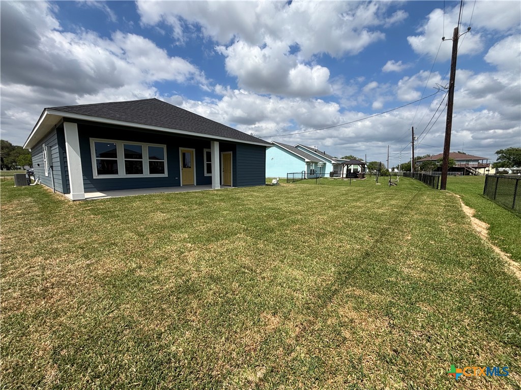 837 Swallow Drive Palacios, TX 77465 - Photo 25 of 35 a big yard with large trees