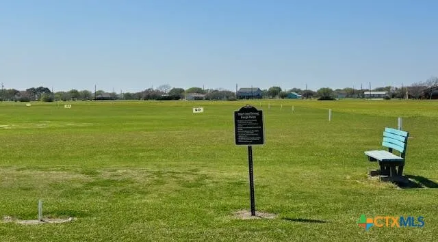 a view of a balcony with chairs
