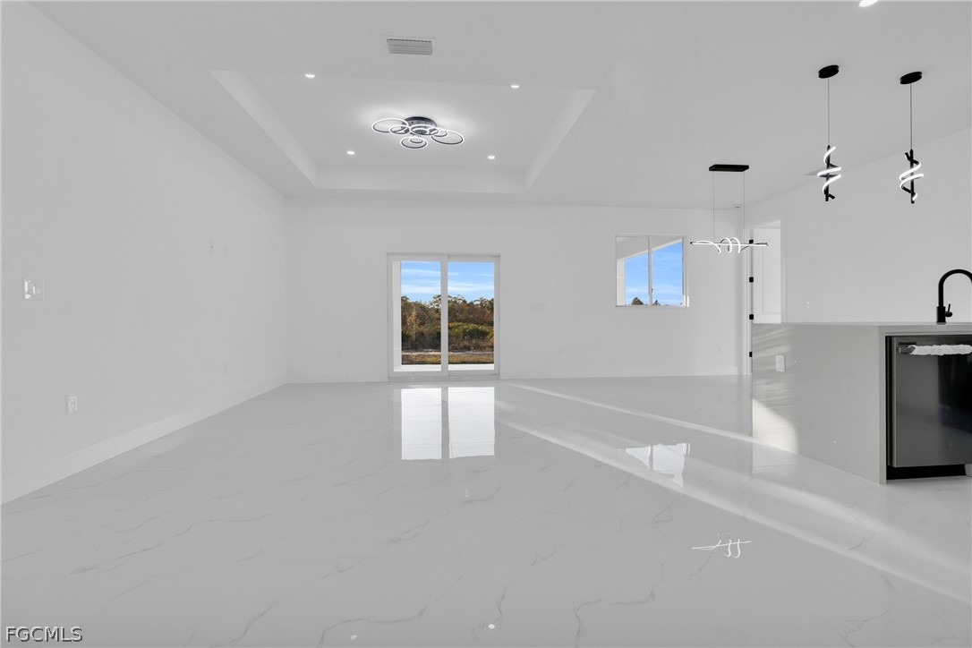 1819 Rush Avenue Lehigh Acres, FL 33972 - Photo 13 of 40 a view of empty room with a fireplace