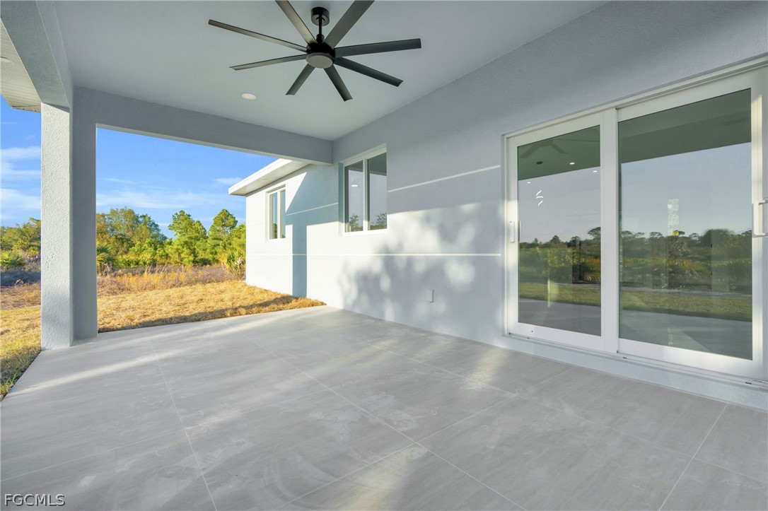 1819 Rush Avenue Lehigh Acres, FL 33972 - Photo 24 of 40 a view of a big room with windows