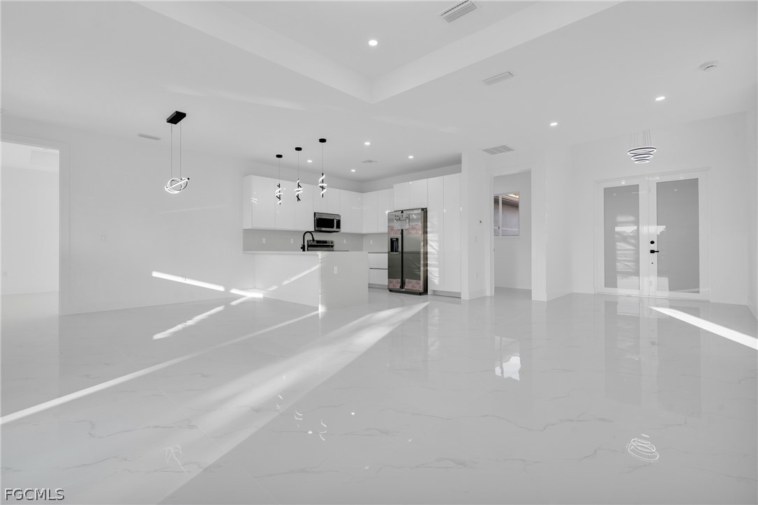 1819 Rush Avenue Lehigh Acres, FL 33972 - Photo 8 of 40 a view of an empty room