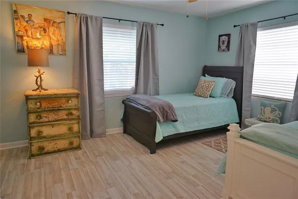 a bedroom with a bed and a closet