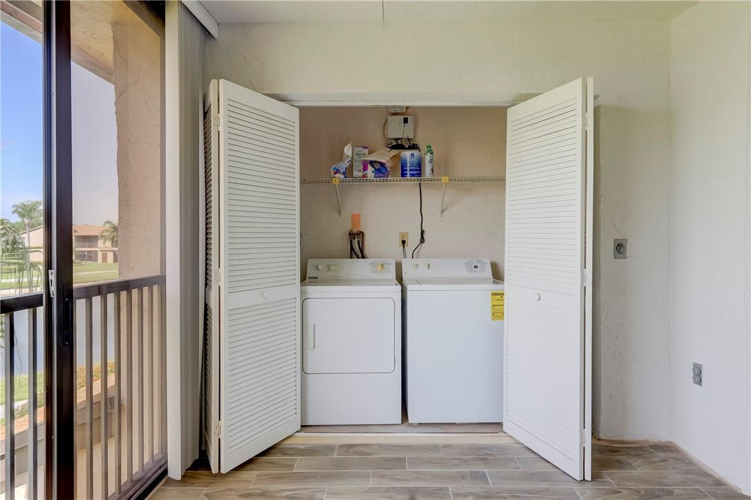 8577 Boca Glades Boulevard, Unit H Boca Raton, FL 33434 - Photo 30 of 34 a room with storage and utility