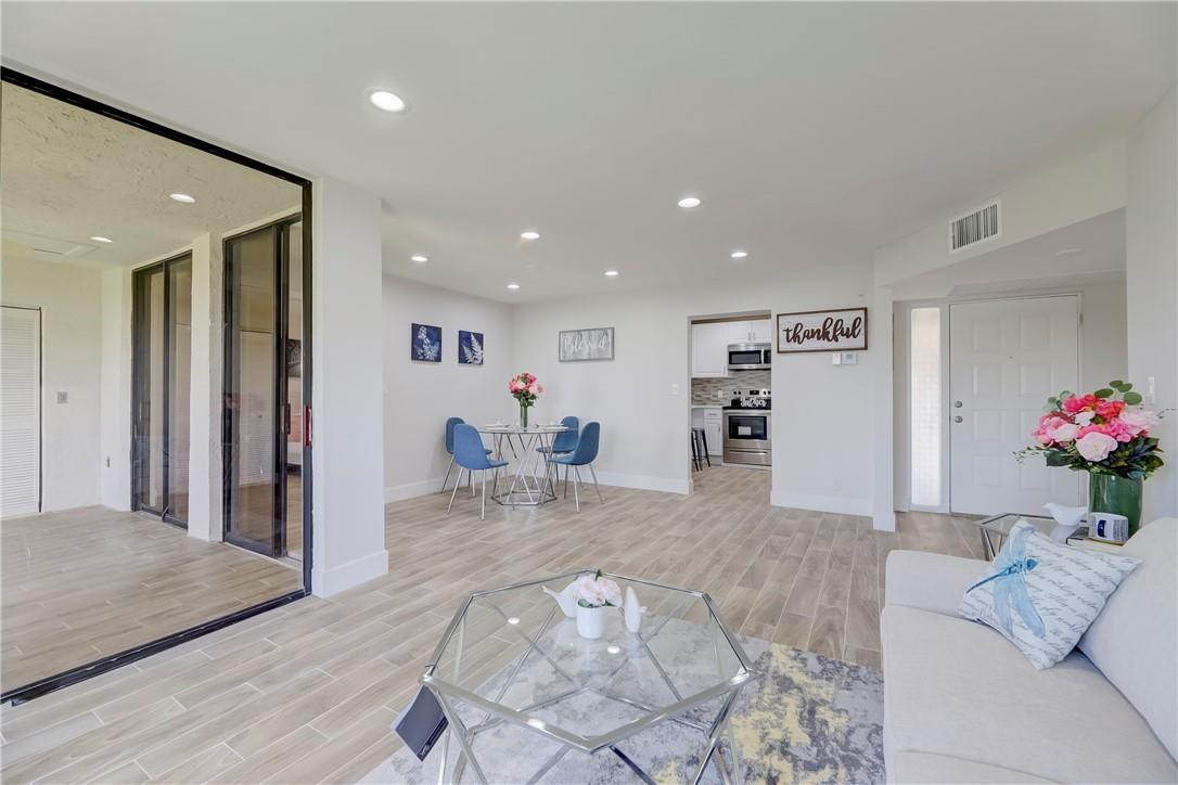 8577 Boca Glades Boulevard, Unit H Boca Raton, FL 33434 - Photo 5 of 34 a view of a living room