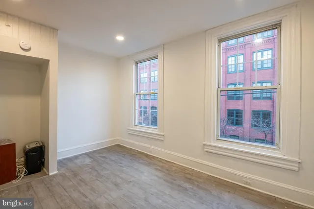 an empty room with windows