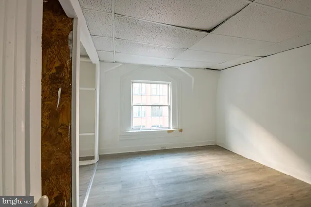 an empty room with windows