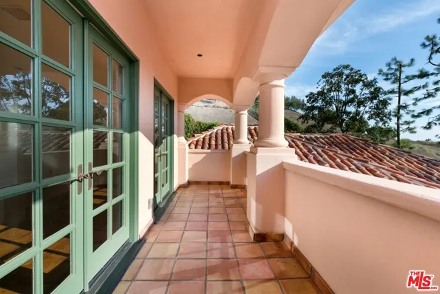 a view of a building with a garden