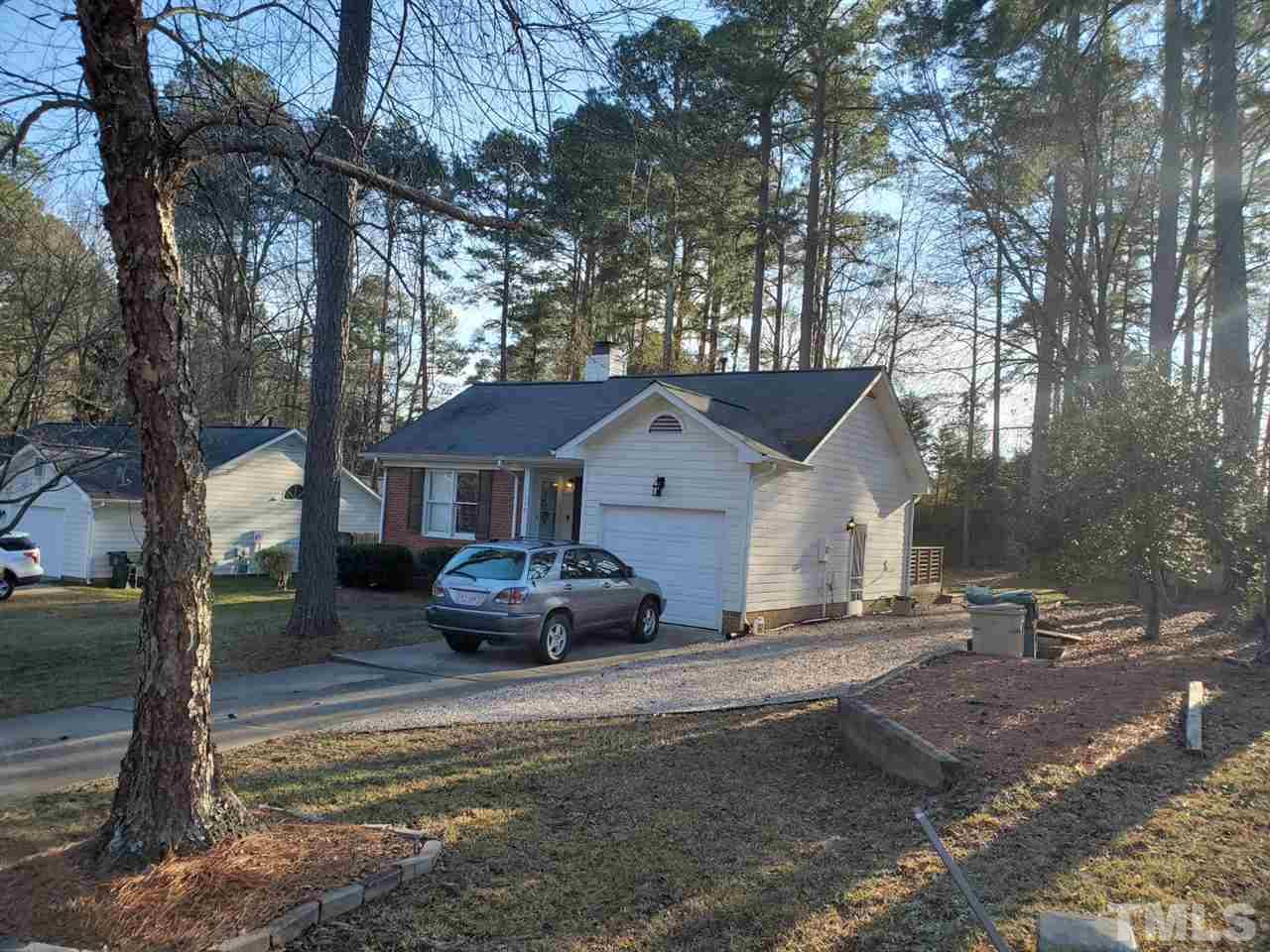 1309 Elkhorn Road Garner, NC 27529 - Photo 2 of 3 a front view of a house with a yard