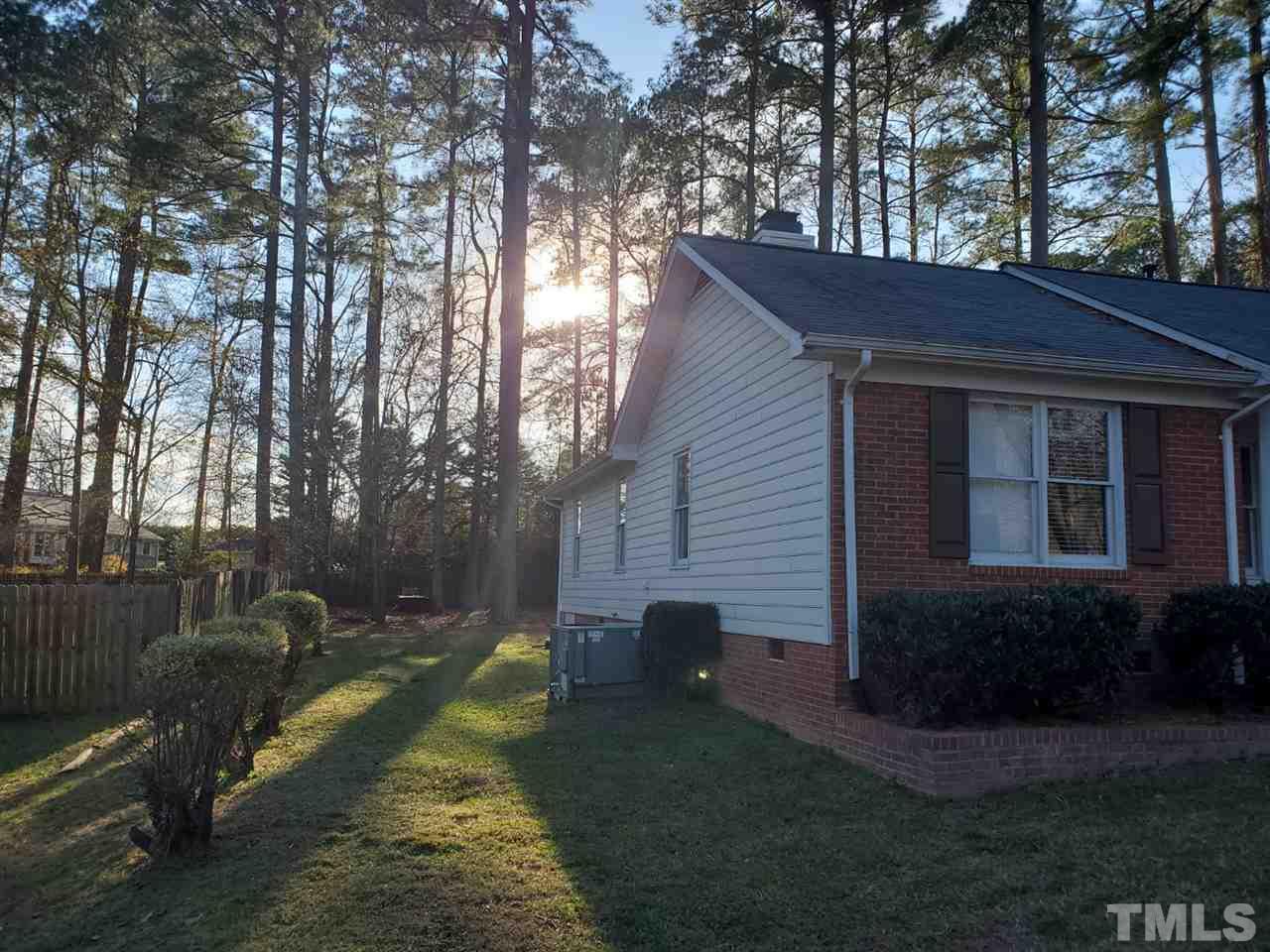 1309 Elkhorn Road Garner, NC 27529 - Photo 3 of 3 a view of backyard with a garden and trees