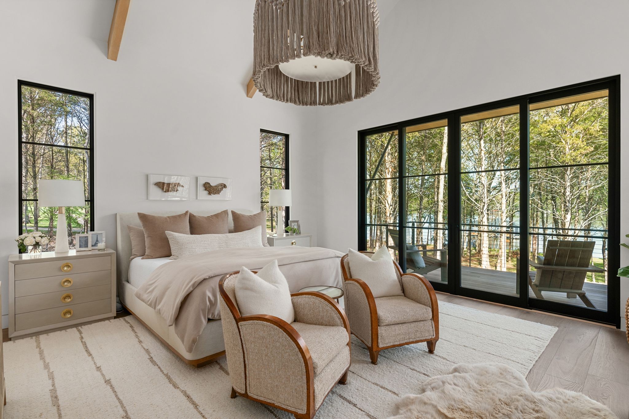 8520 Saundersville Road Mount Juliet, TN 37122 - Photo 35 of 70 a bedroom with a large bed and a large window