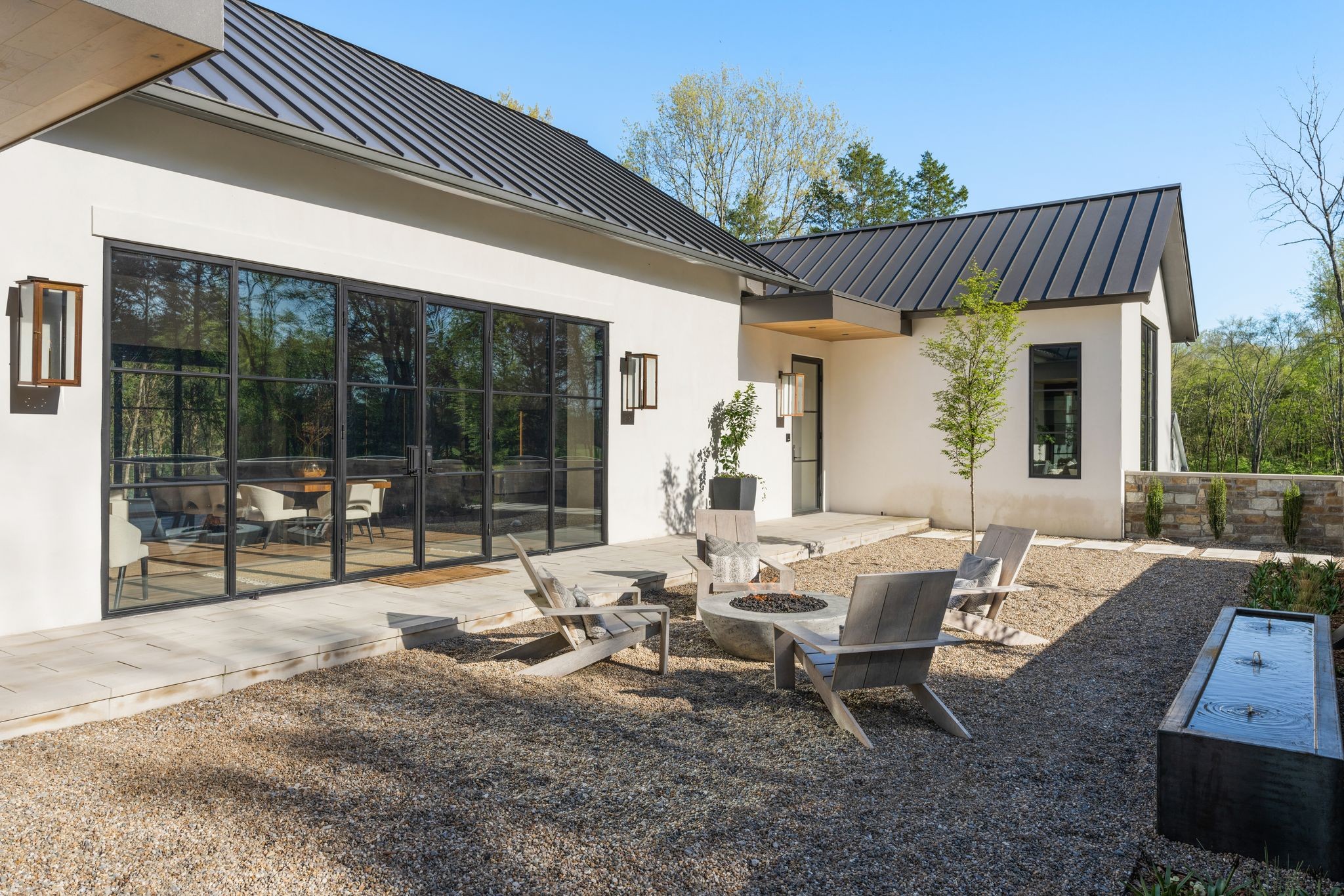 8520 Saundersville Road Mount Juliet, TN 37122 - Photo 5 of 70 a view of a patio with table and chairs and potted plants
