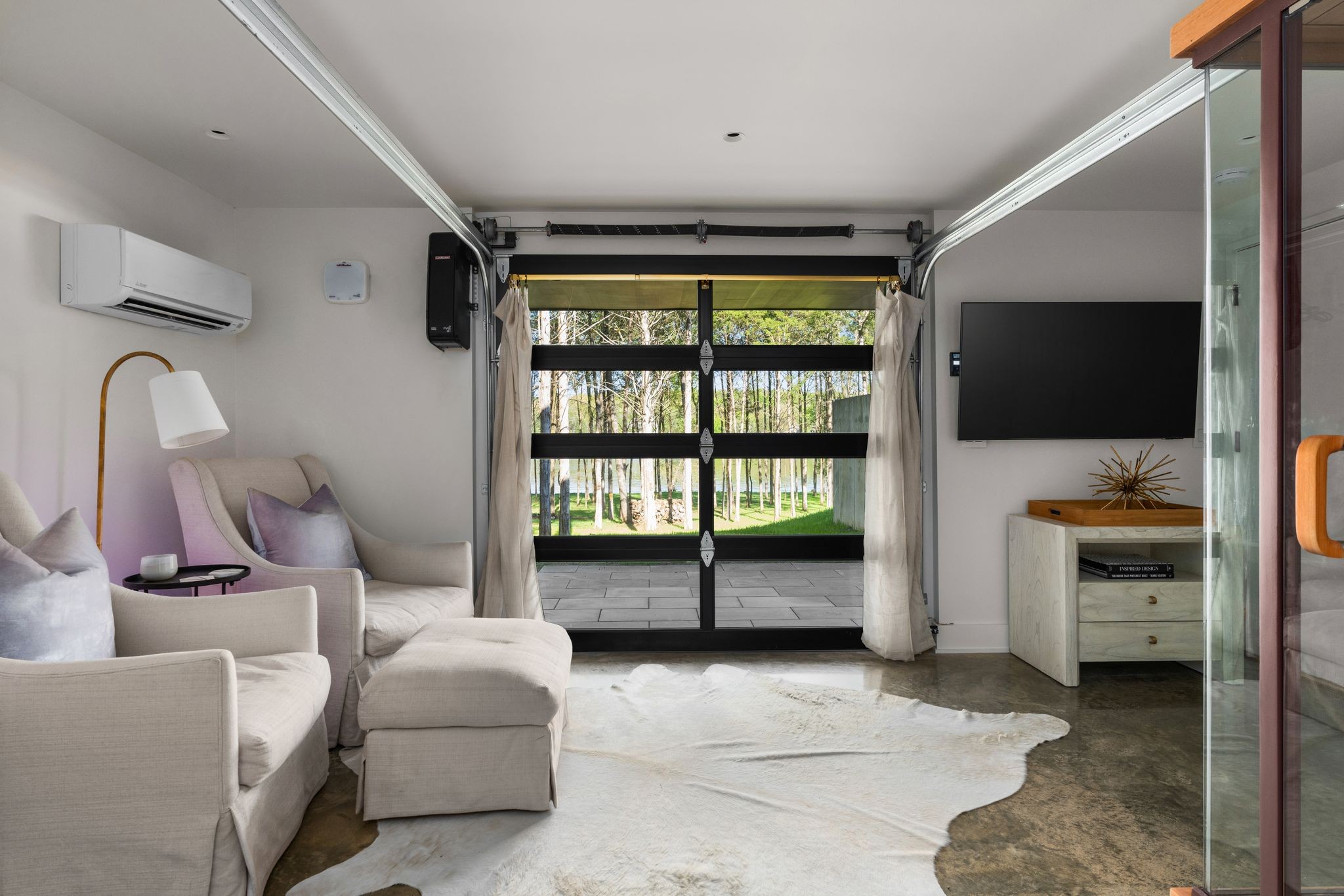 8520 Saundersville Road Mount Juliet, TN 37122 - Photo 63 of 70 a living room with furniture and a flat screen tv