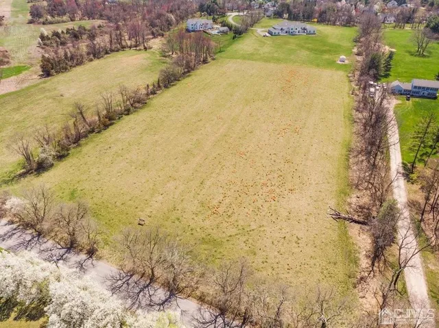 a view of lake with mountain in the back